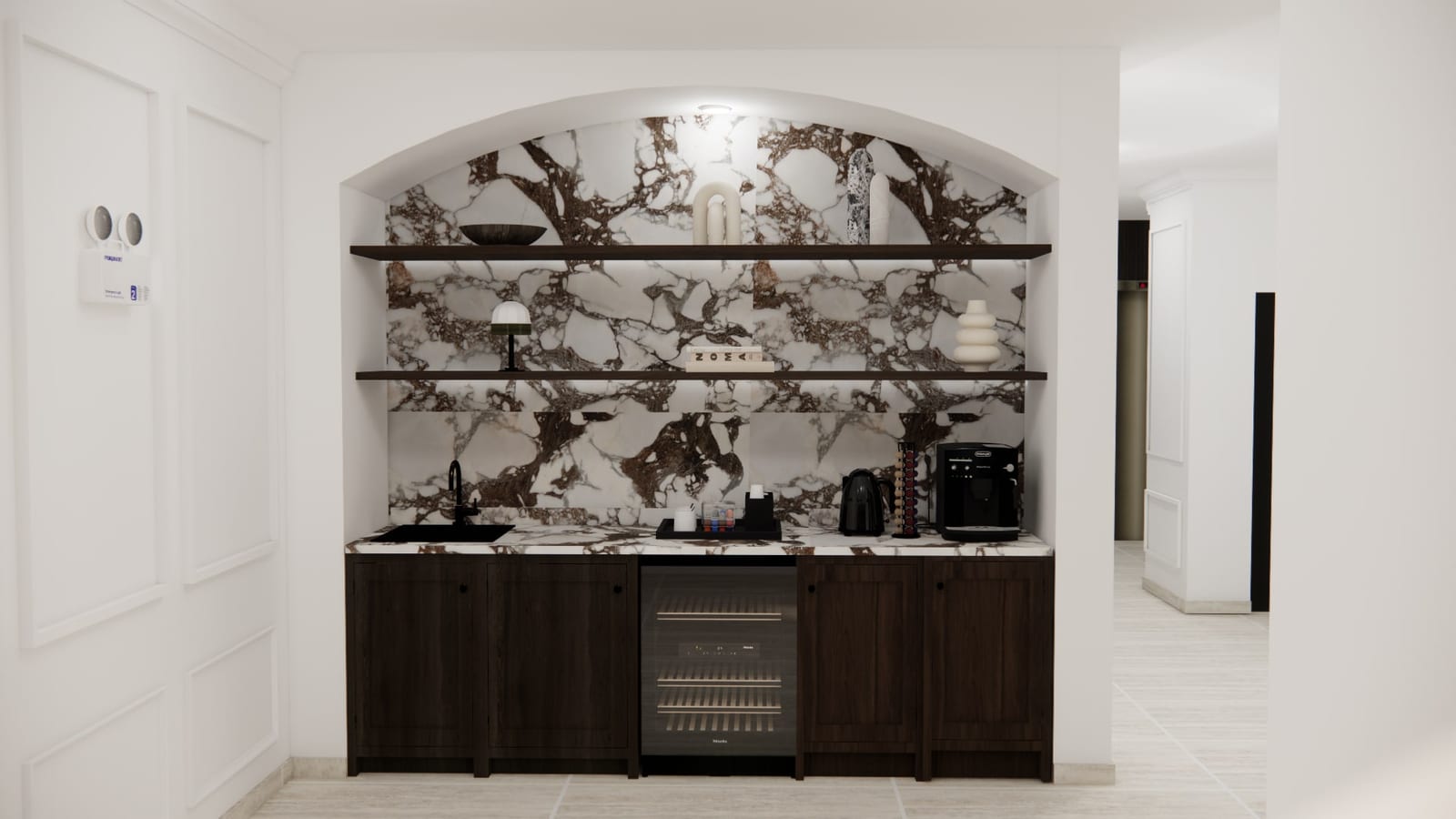 Resident coffee station with marble backsplash and dark wood cabinetry